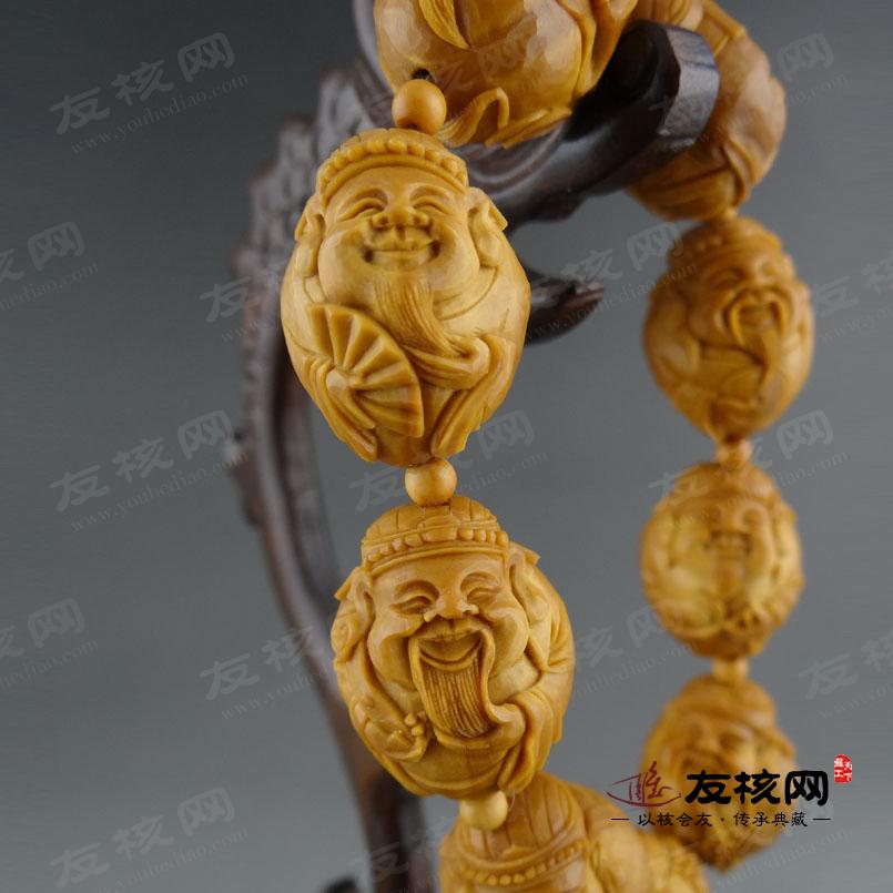 高梅 八大财神手串橄榄核雕 侧面图