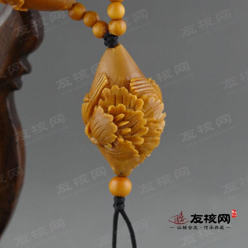 高梅 凤穿牡丹长串橄榄核雕 收藏证书