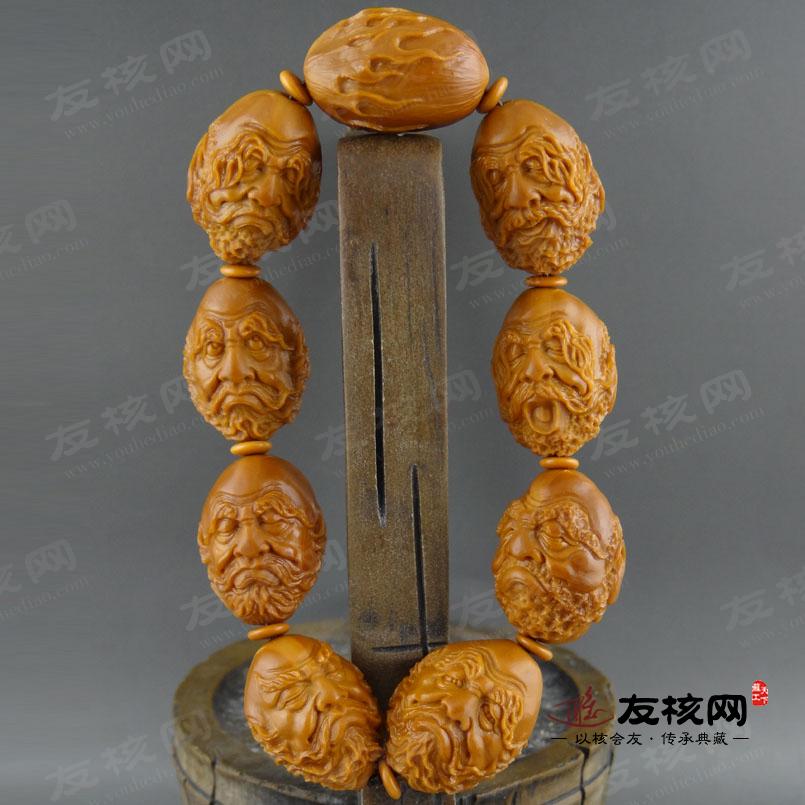 赵晗 八大达摩手串橄榄核雕 正面