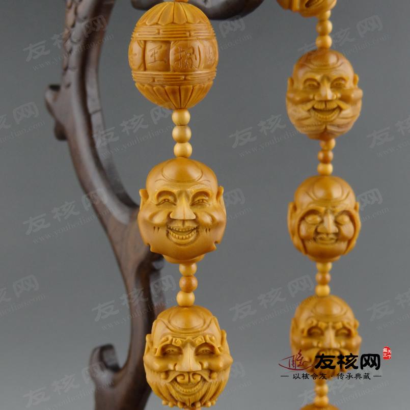 王晓星 单面十八罗汉长串橄榄核雕 落款