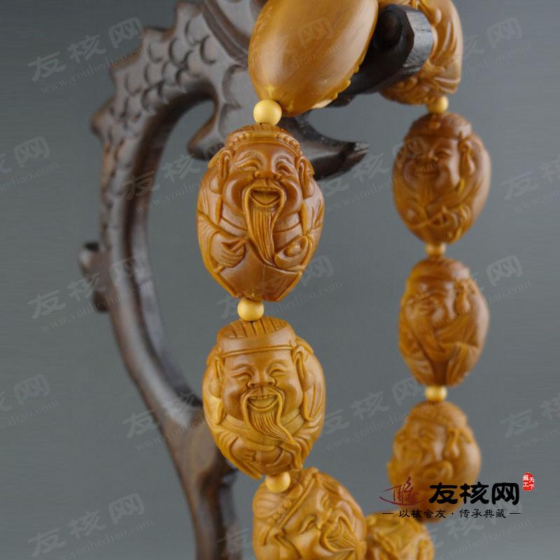 苏工橄榄核 杨易八大财神文玩手串 侧面
