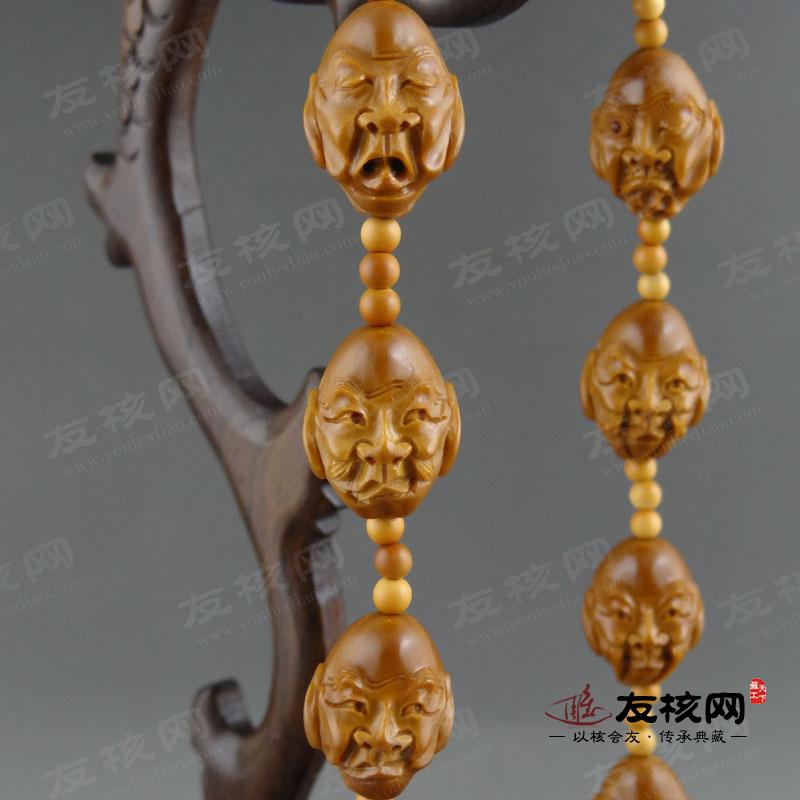 橄榄核雕铁核 夏菲单面十八罗汉 侧面