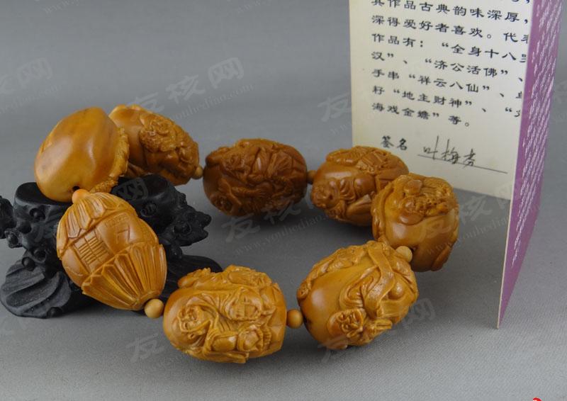 叶梅芬三面十八罗汉 苏工橄榄核雕 证书