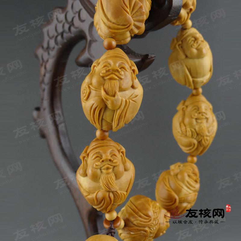 苏工橄榄核雕 怡洁 小财神 手串 侧面