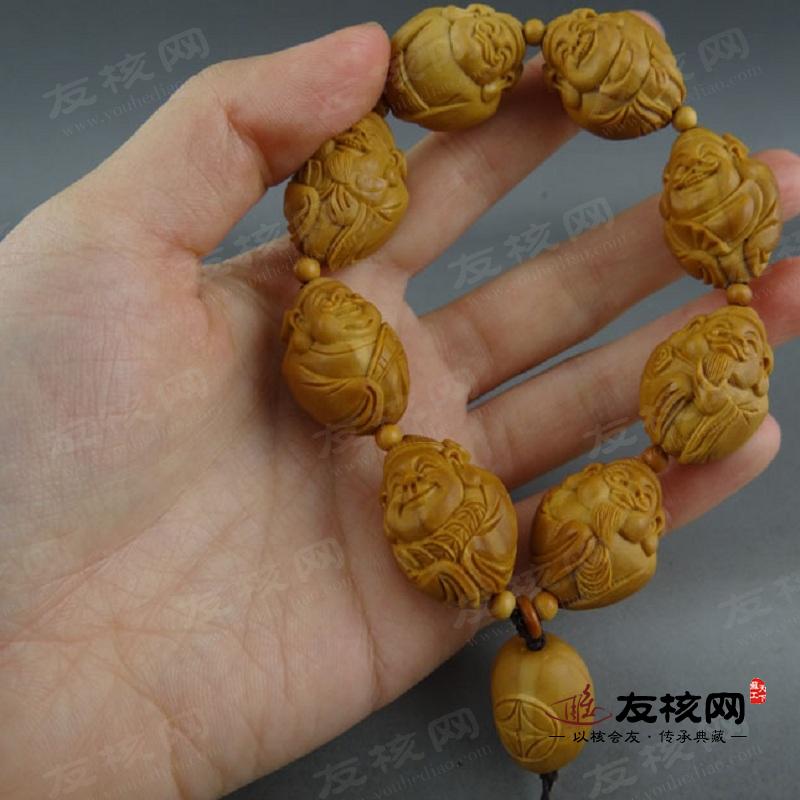 苏工橄榄核雕 怡洁 小财神 手串 侧面